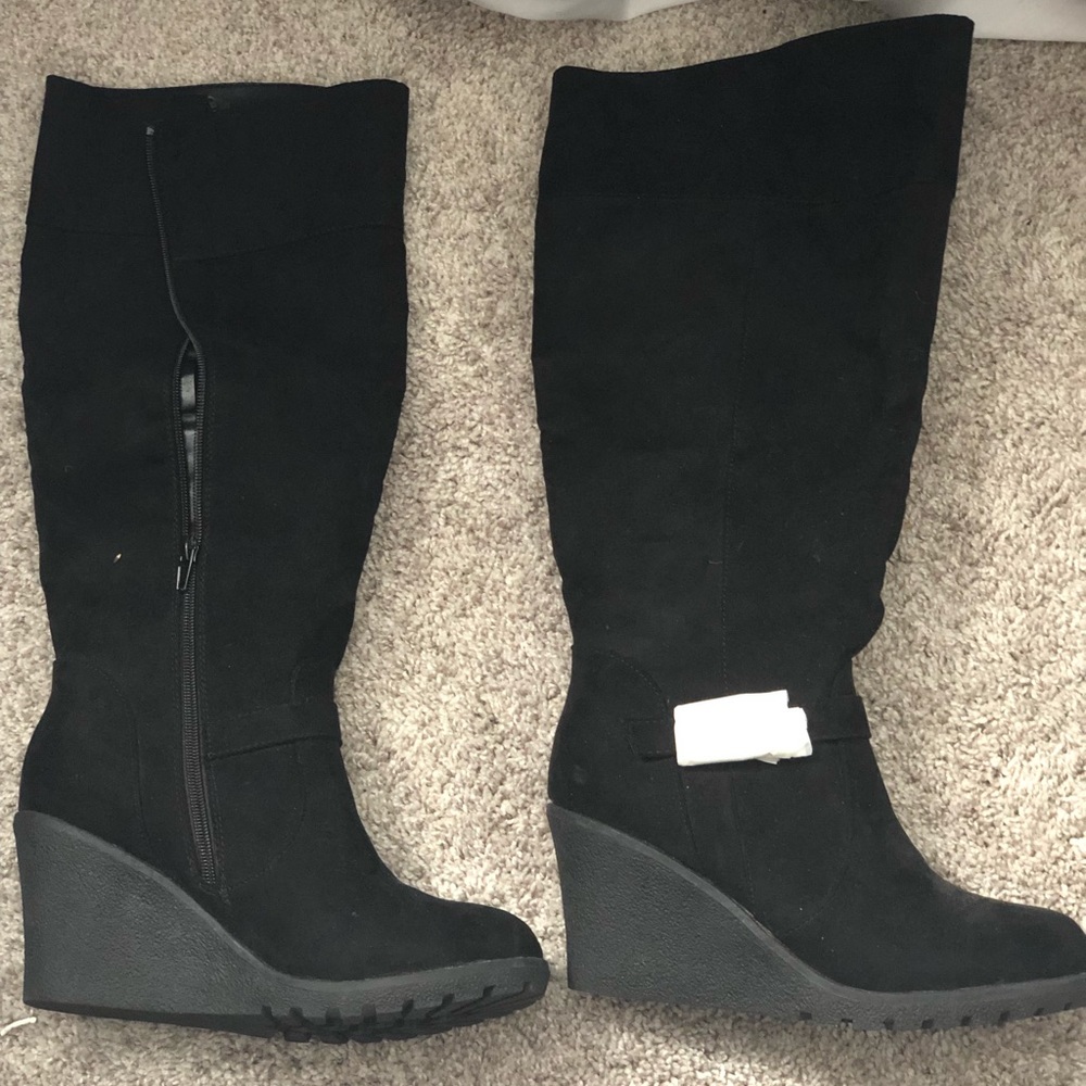 Tall black boots